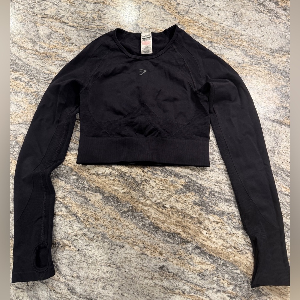 Gymshark Black Long Sleeve Crop Top with open back.